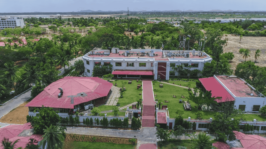 Sky view of Chariot Beach Resort showcasing its luxurious layout and beachfront charm.