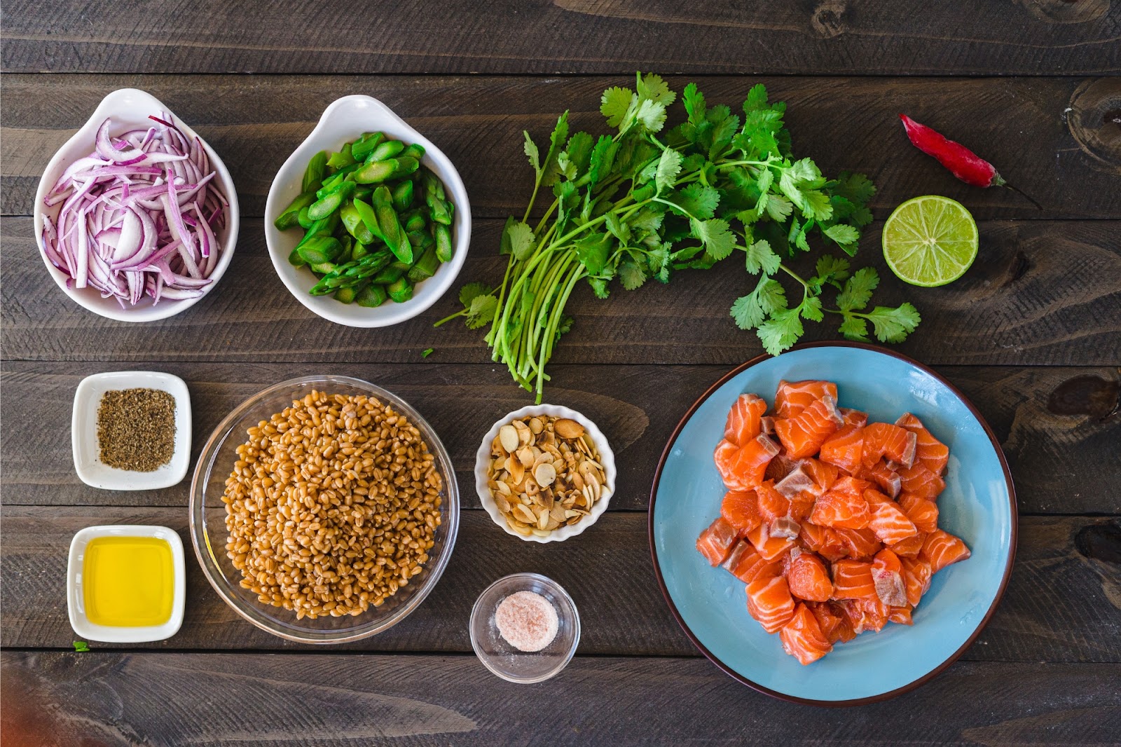 Salmon, vegetables and seasonings mise en place