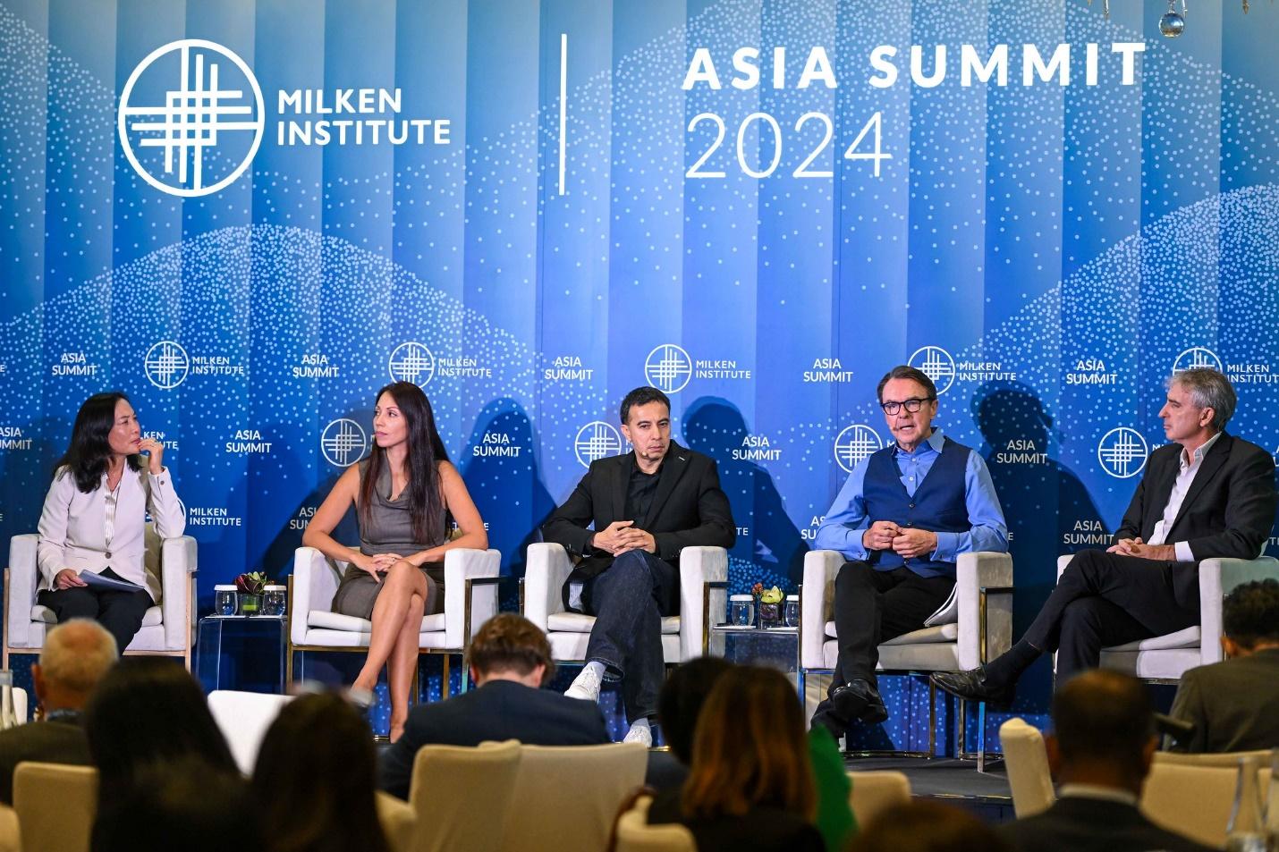 A group of people sitting in chairs