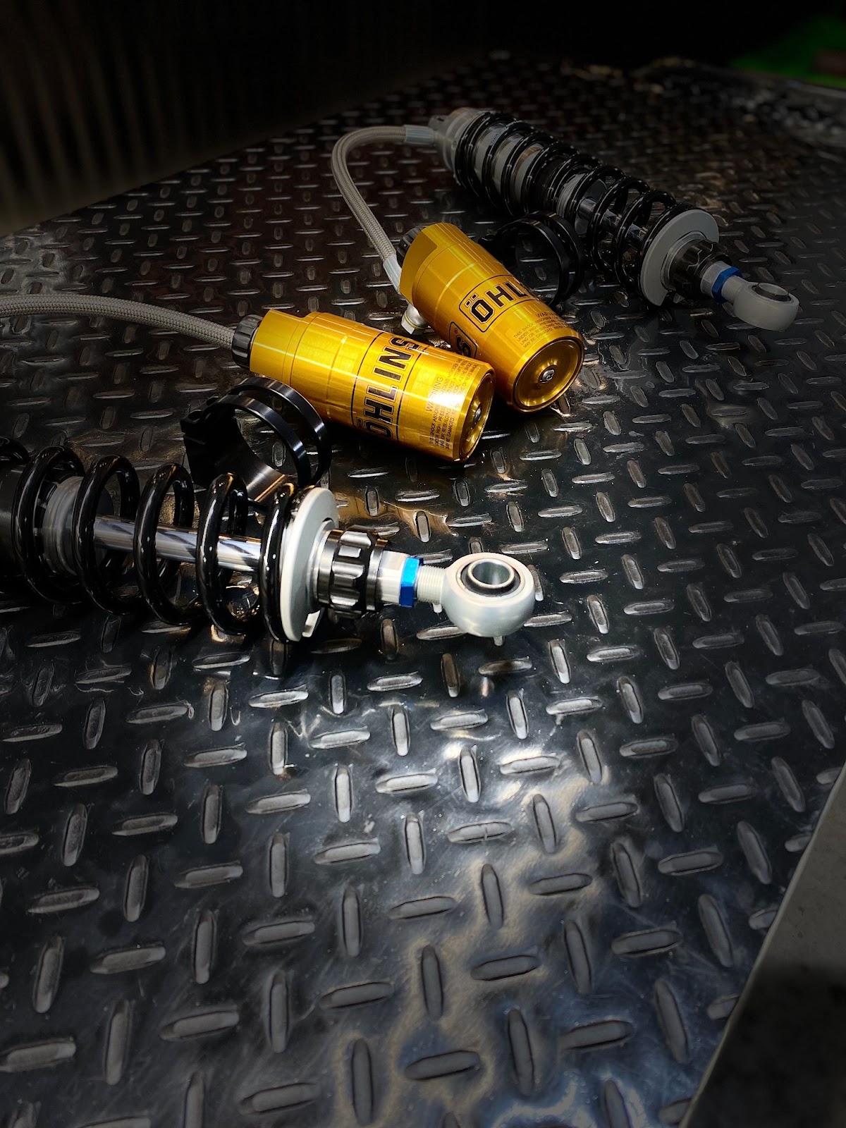 A pair of Ohlins 13 inch STX36 (HD357) Remote Reservoir