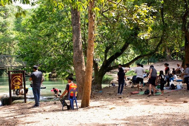 Thai people and travelers foreigner travel relax and play swimming in Namtok Chet Sao Noi small waterfall at National Park on November 13 2018 in Saraburi Thailand