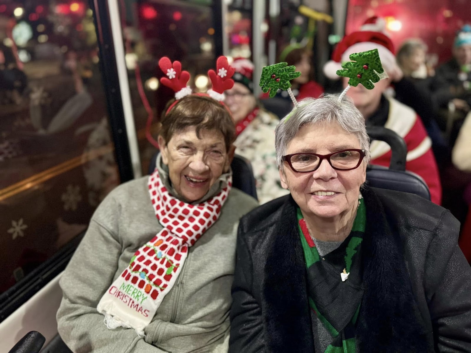 Picture of seniors wearing Christmas-themed clothing