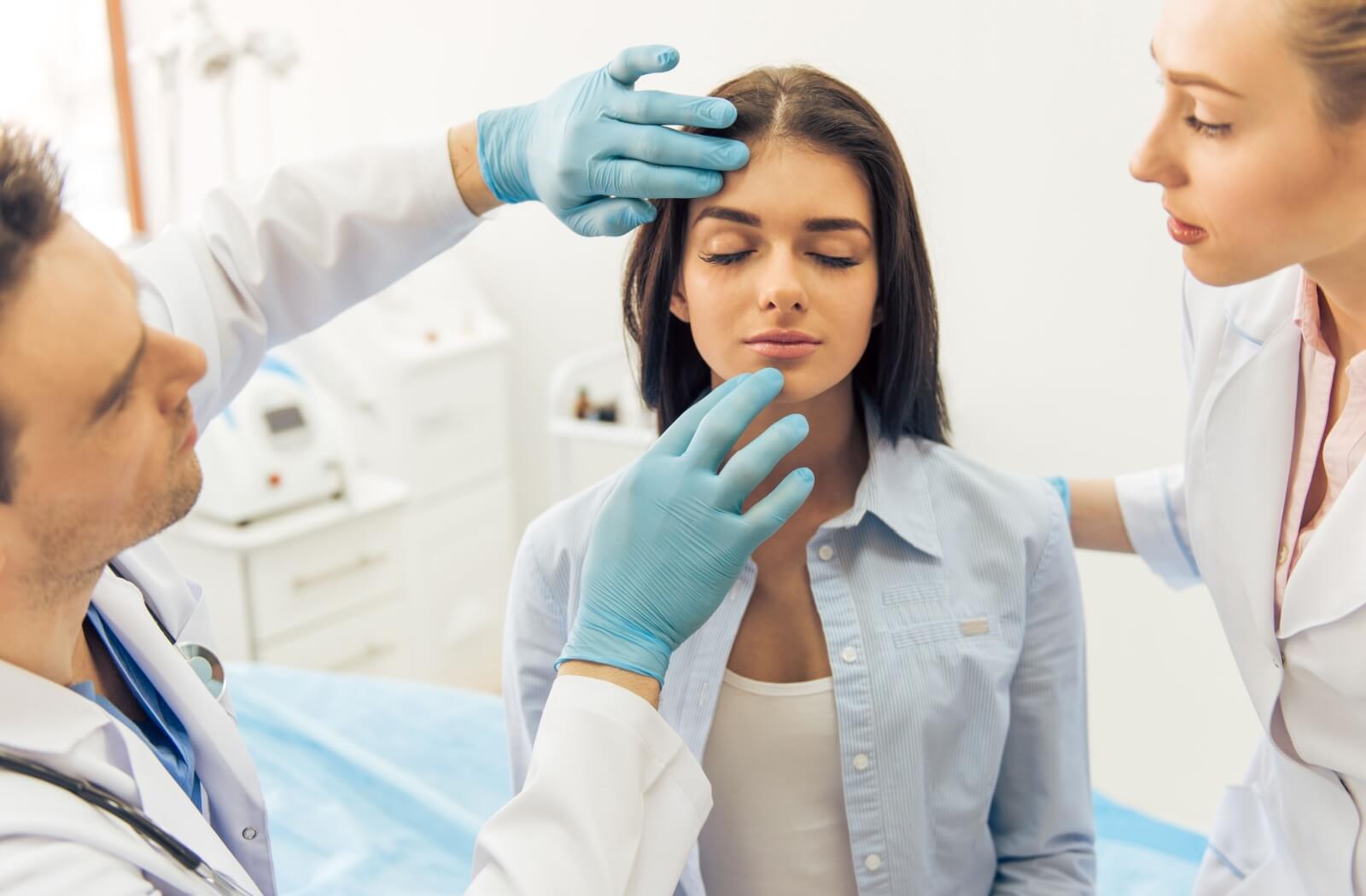 An optometrist discusses IPL therapy for dry eye relief with their patient.