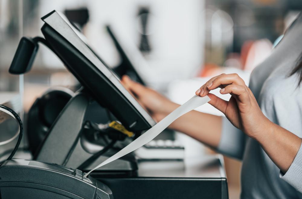 pulling receipt out of the till