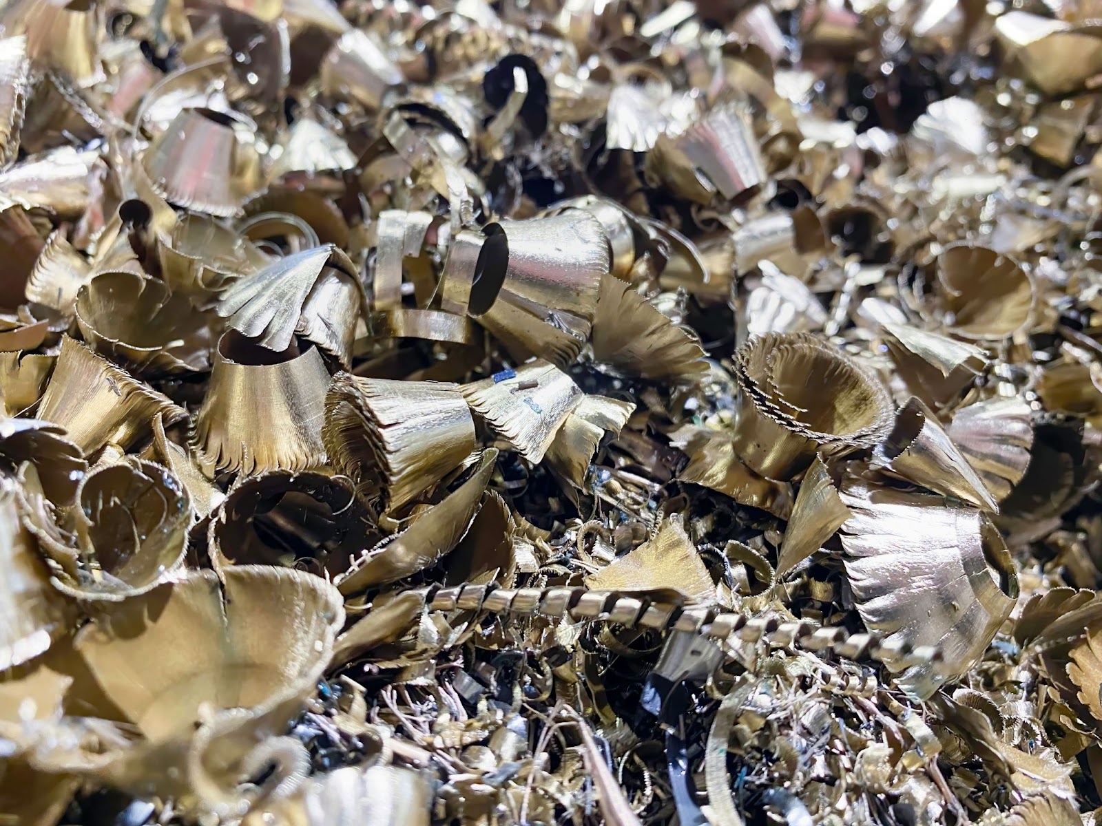 Brass machining turnings ready for processing and recycling.