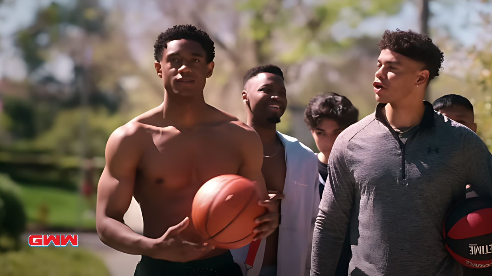 Boys walking with basketballs in The Sex Lives of College Girls Season 3