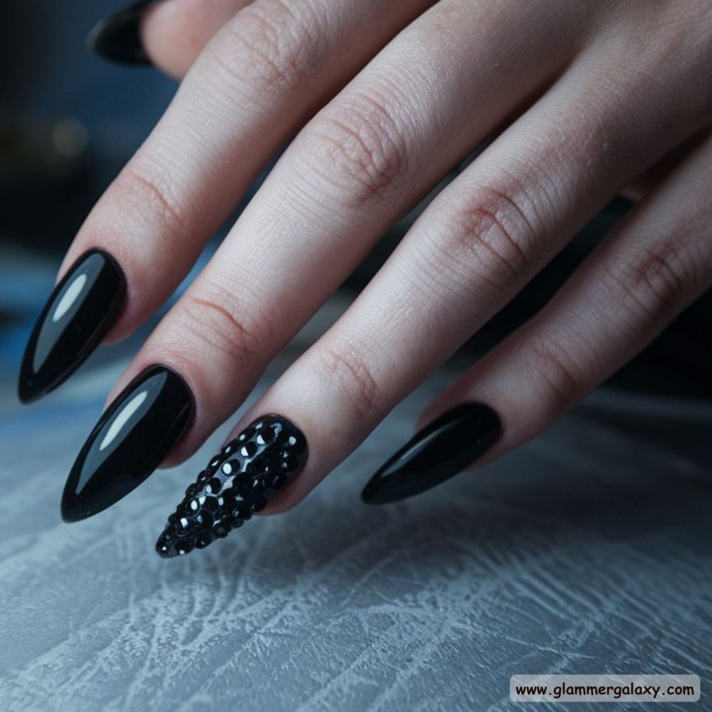 Dark Winter Nails having Bold Black Stiletto Nails
