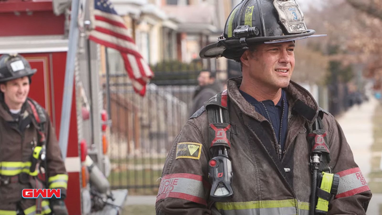 Taylor Kinney as Kelly Severide in a Chicago Fire outdoor scene.