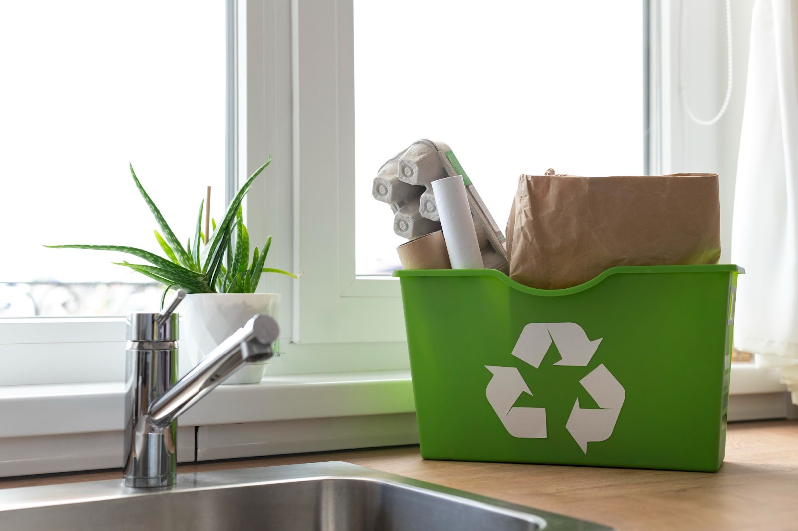 Household items collected in a bag for recycling.