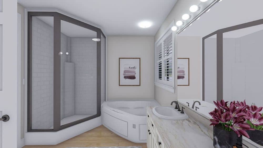 There's also a walk-in shower enclosed in glass panels with gray trims.