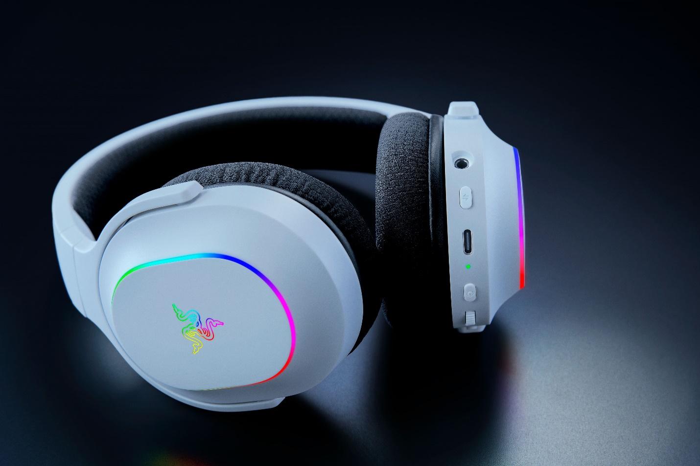 A white headphones with a colorful light

Description automatically generated