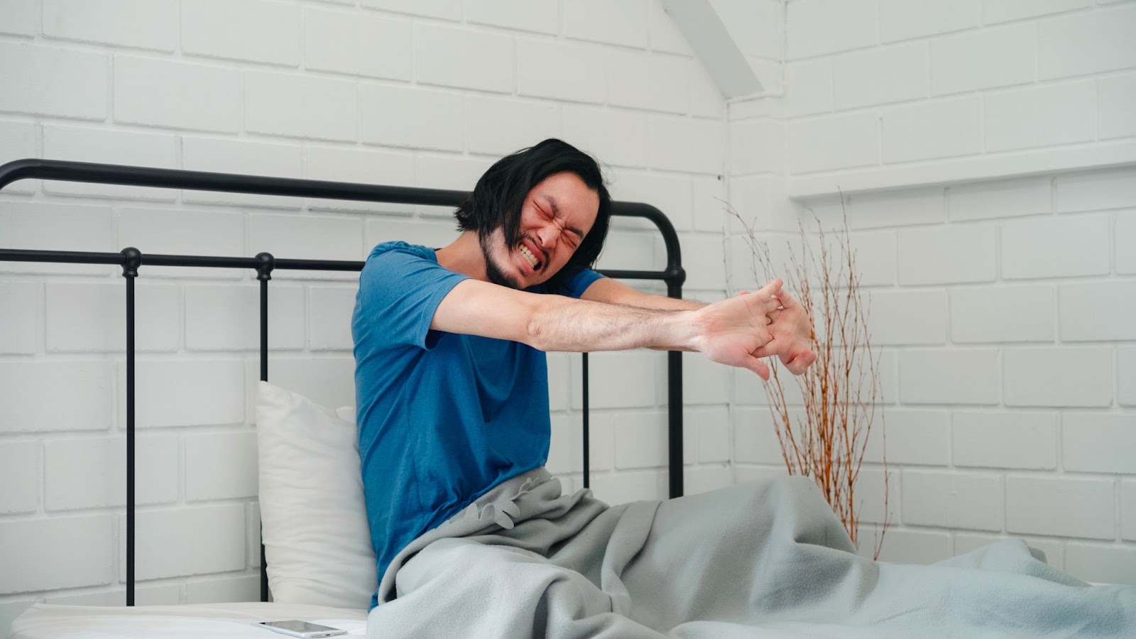 Person with aches and pains in the morning needing to replace mattress
soon