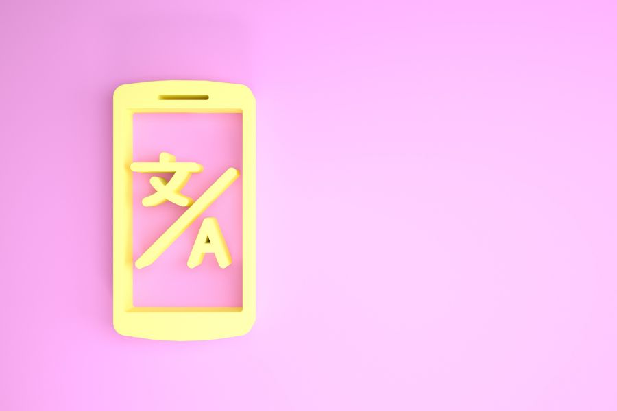 Trint transcription: Yellow mobile icon with translation symbols on pink background.