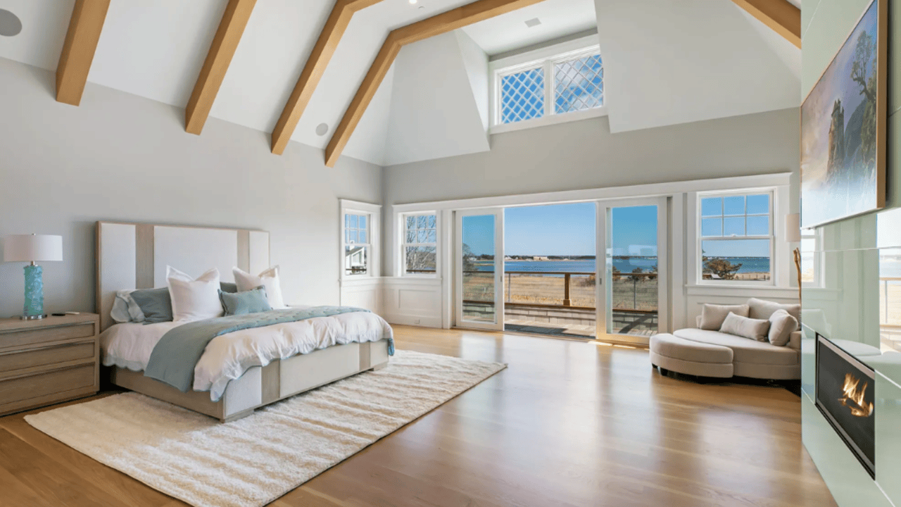 Tour This 8,094 Sq Ft Shingle-Style Waterfront Estate in Quogue, NY with Floating Staircase and 300-Bottle Wine Cellar