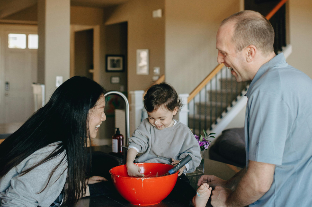 Family in the kitchen, cooking and having fun // Healthier Baby Today