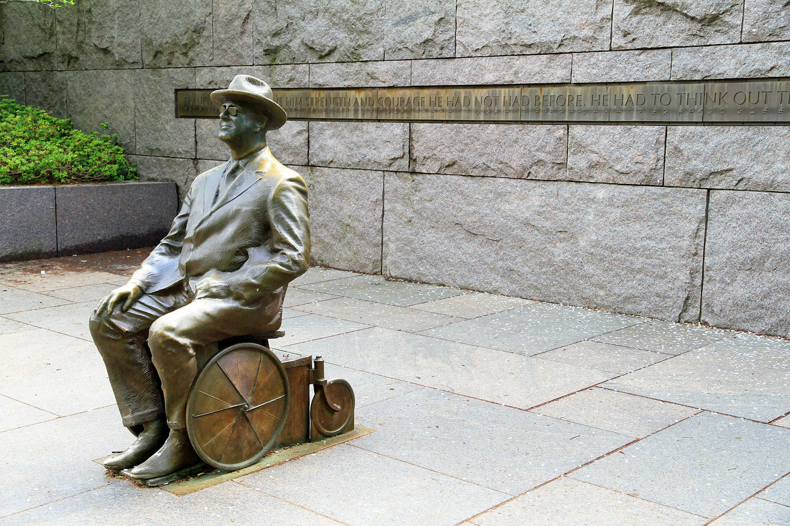 A statue of a person in a wheelchair

AI-generated content may be incorrect.