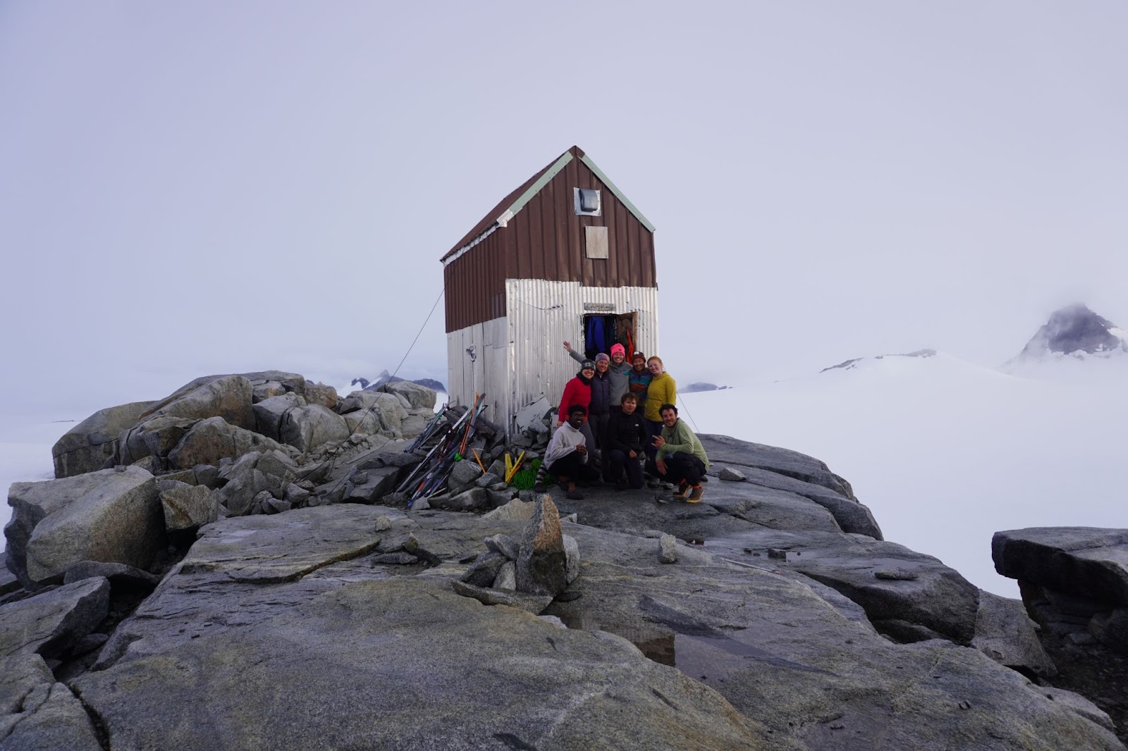 The mass balance squad poses in front of Camp 9.