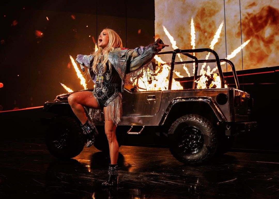 Carrie Underwood with her Car in a concert