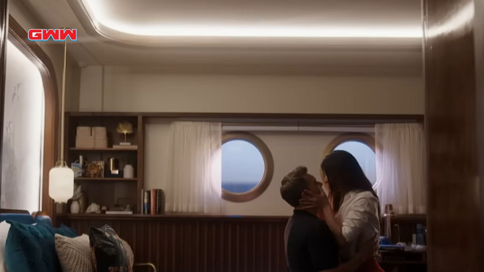 A scene from Doctor Odyssey showing Joshua Jackson and Phillipa Soo sharing an intimate moment