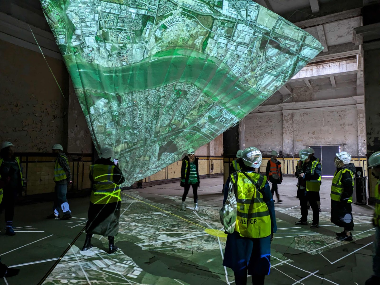 People interacting with Strata floating screen