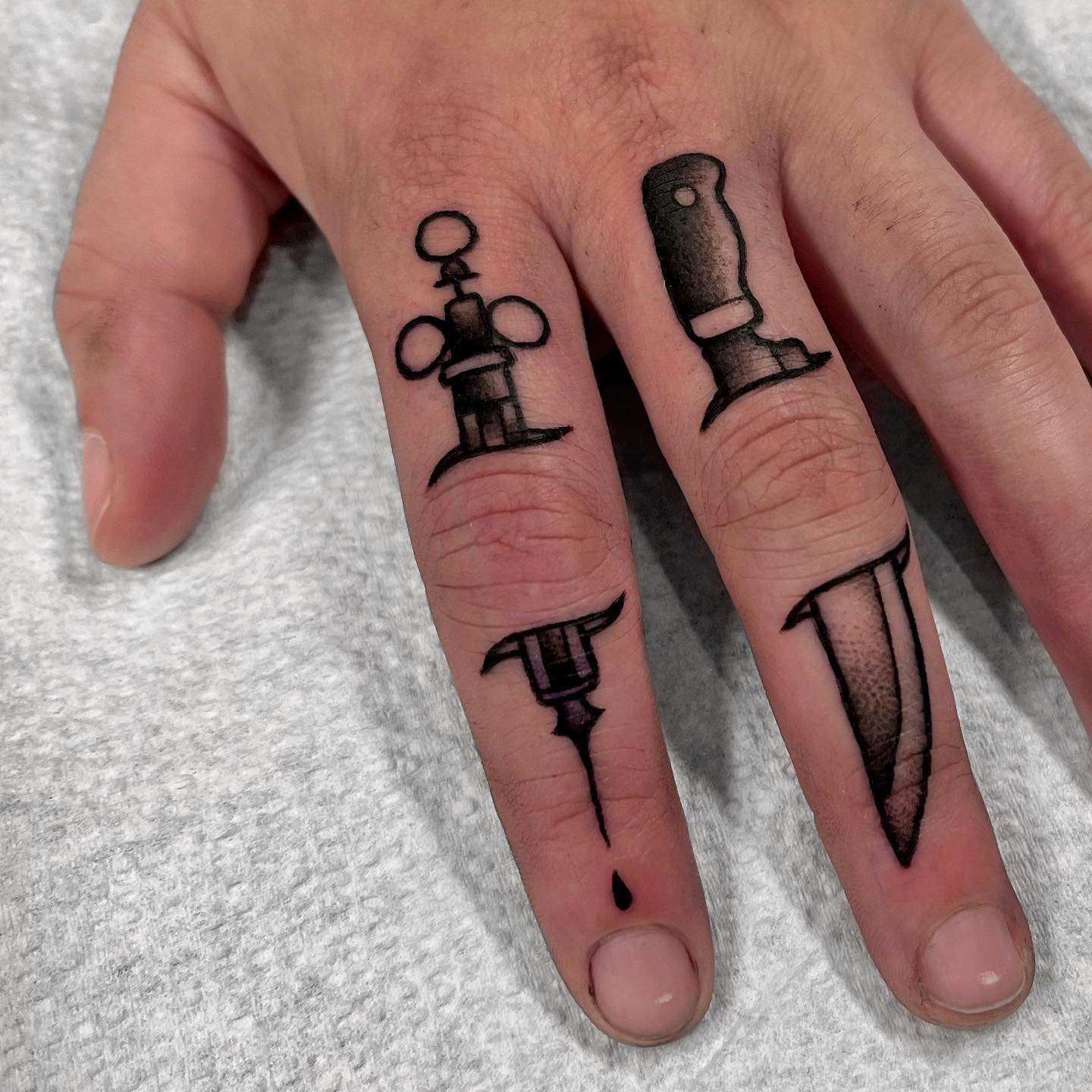 Knife Finger Tattoo