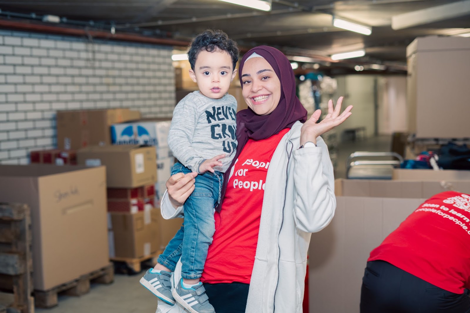 Walaa and her nephew smile for the camera. 