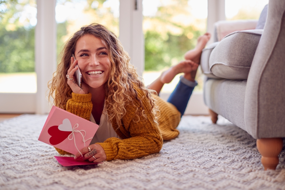 Long-distance friend reading friendship Valentine’s Day card