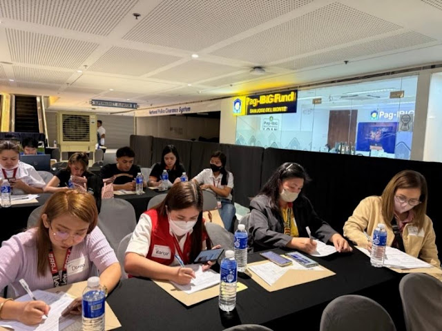 A group of people sitting at tables in a room with a few tables and a few tables with a few tables and a few tables with a few tables and a few tables with a few tables andAI-generated content may be incorrect.