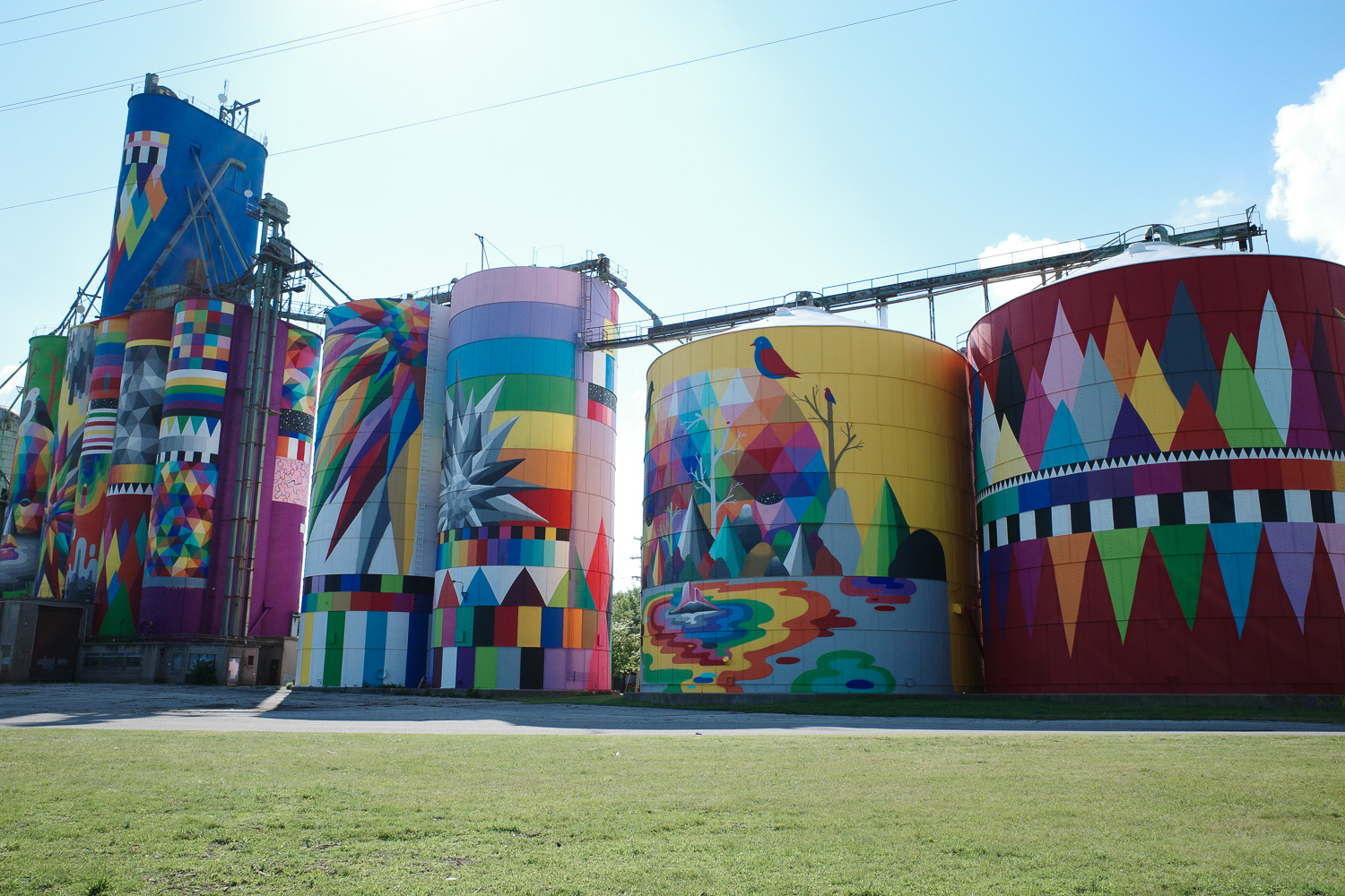 Shine Bright Saginaw mural painted over grain silos.
