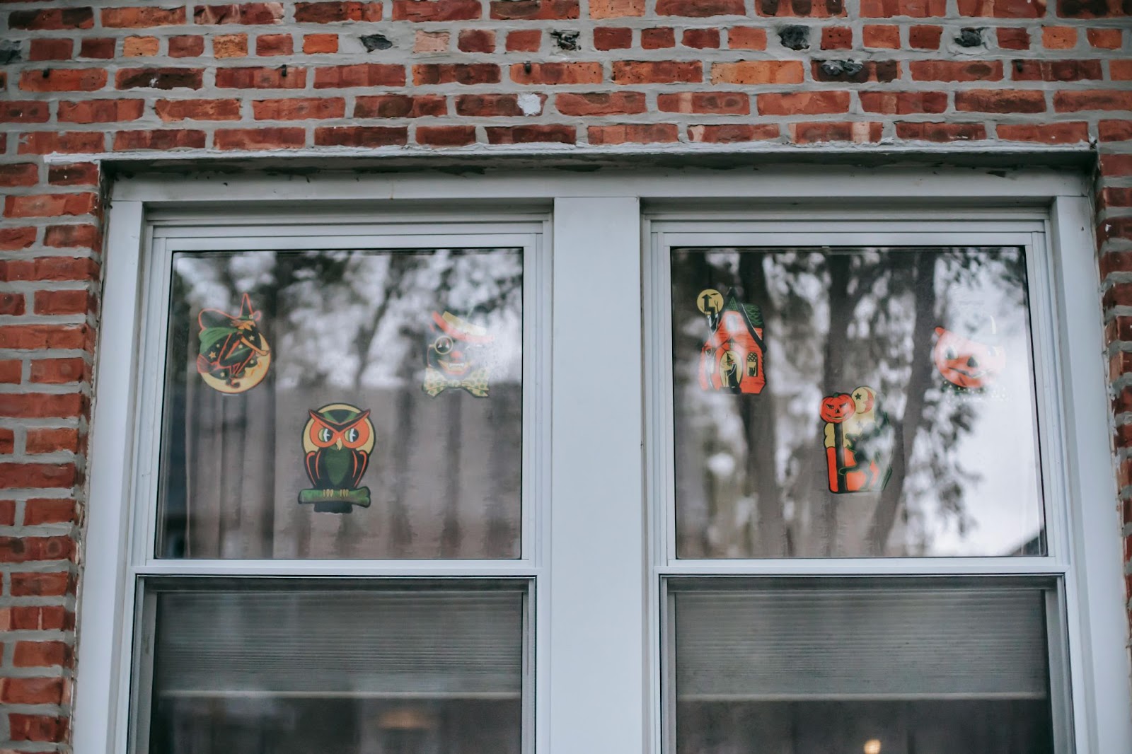 Windows decorated with halloween-themed stickers