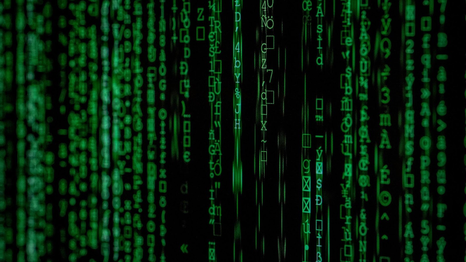 Close-up photo of matrix background symbolizing access to cybersecurity expertise and advanced technologies in threat detection and protection.