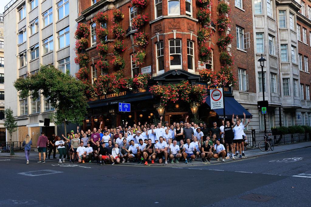 A group of people posing for a photo Description automatically generated