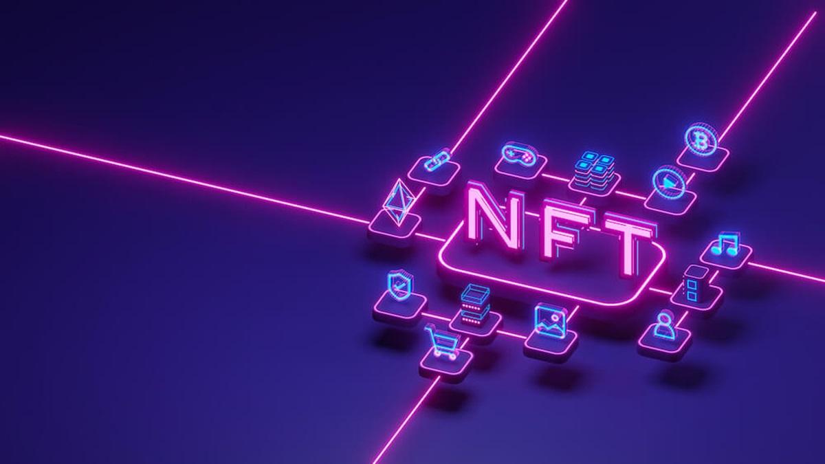 Neon “NFT” with digital icons connected by pink lines on a dark background