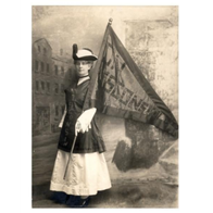 A person in a dress holding a flag AI-generated content may be incorrect.
