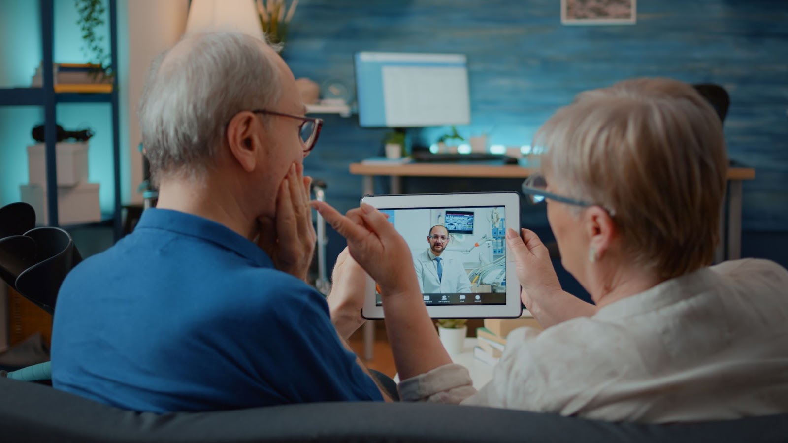 Elder people using video teleconference to chat.