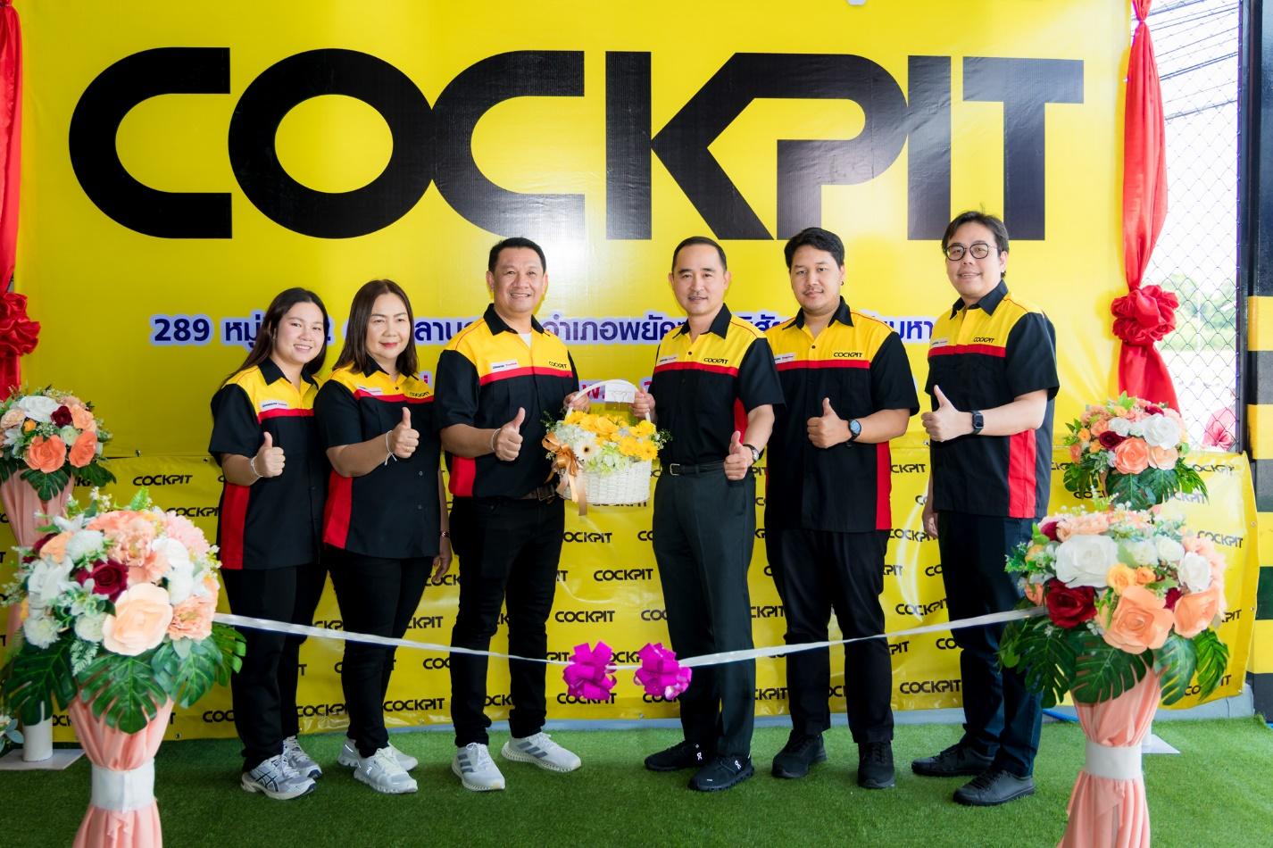 A group of people standing in front of a yellow sign

AI-generated content may be incorrect.