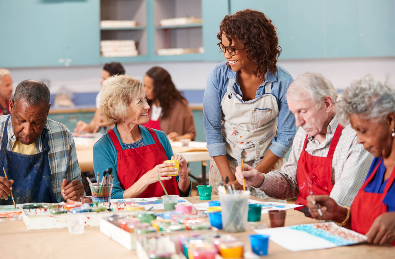  group of older adults in an art class.