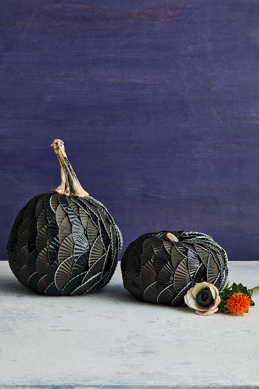 diy halloween decorations, two black cupcake liner pumpkins