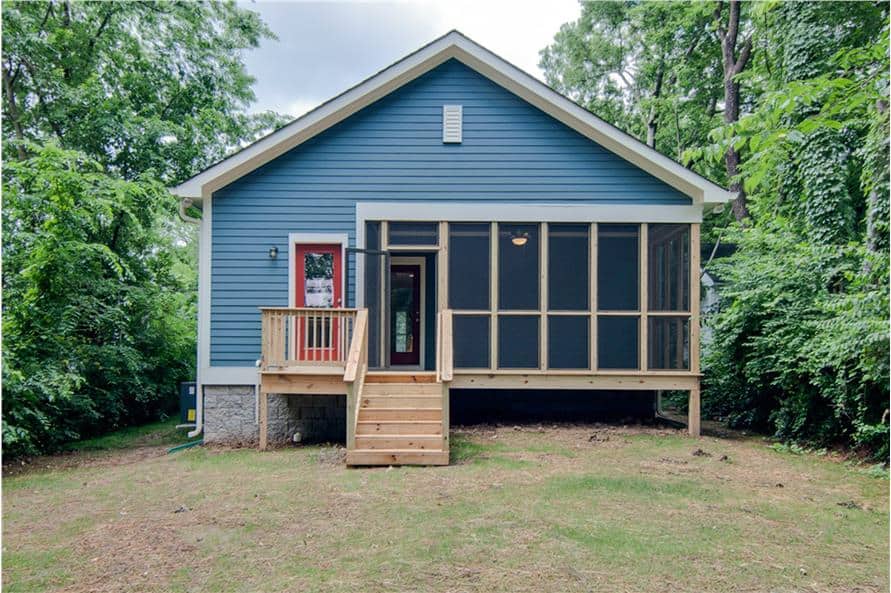 Rear exterior view with a screened porch complemented with a small deck and wooden stoop.