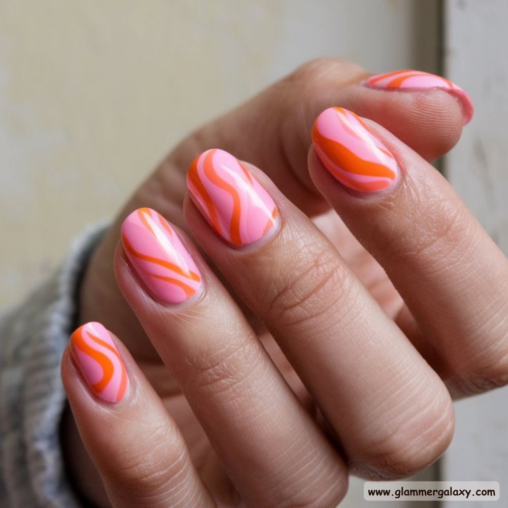 Orange and Pink Summer Nails with Playful Pink & Orange Swirls