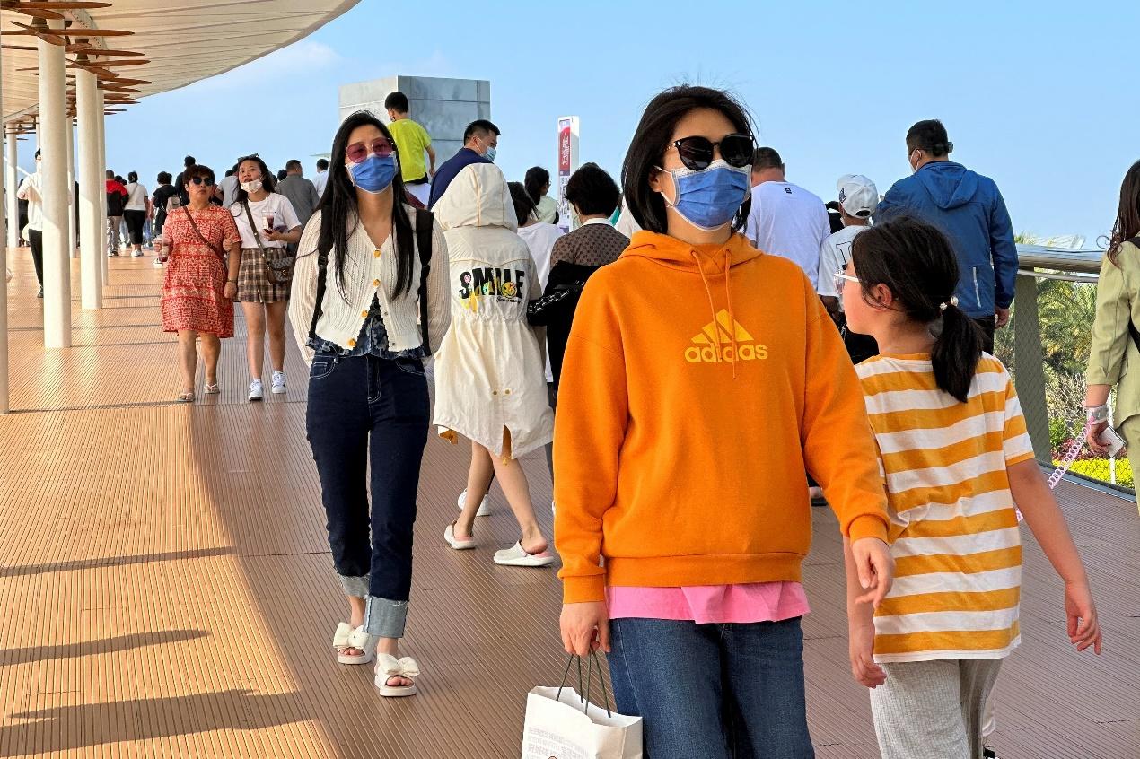 People visit the Sanya International Duty-Free shopping complex in Sanya