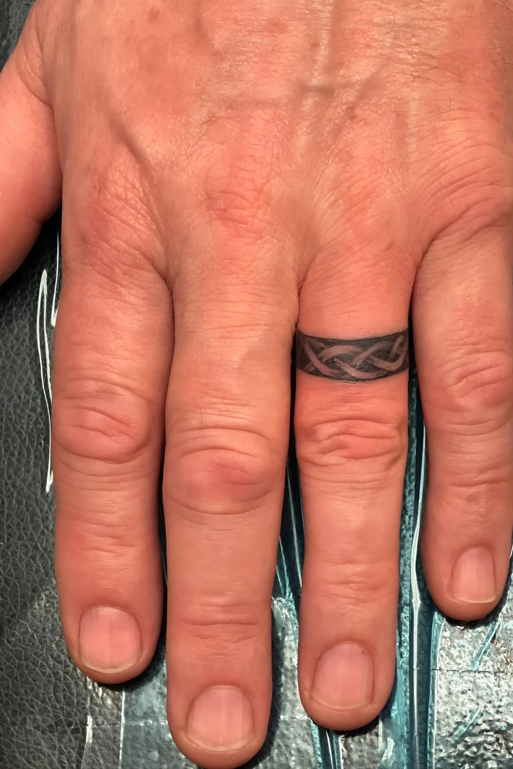 Men’s Wedding Finger Tattoo
