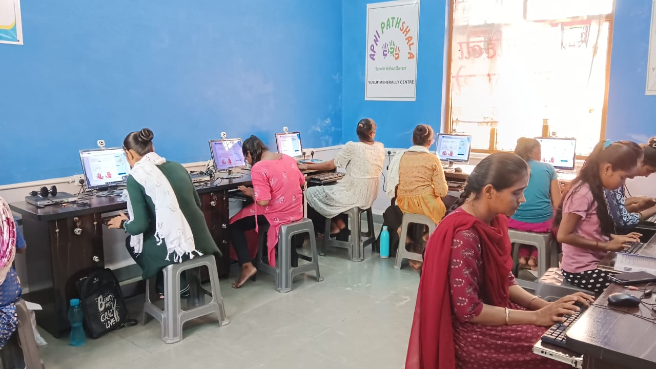 Women working on computers at Yusuf Meherally Centre, that focuses on digital education in India