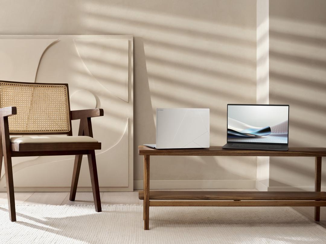 A computer on a coffee table