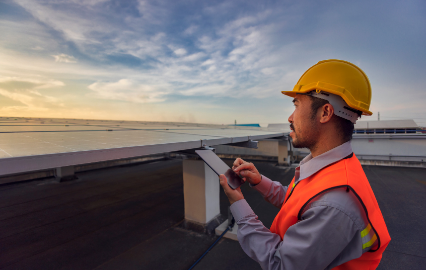 a man checking on a roof