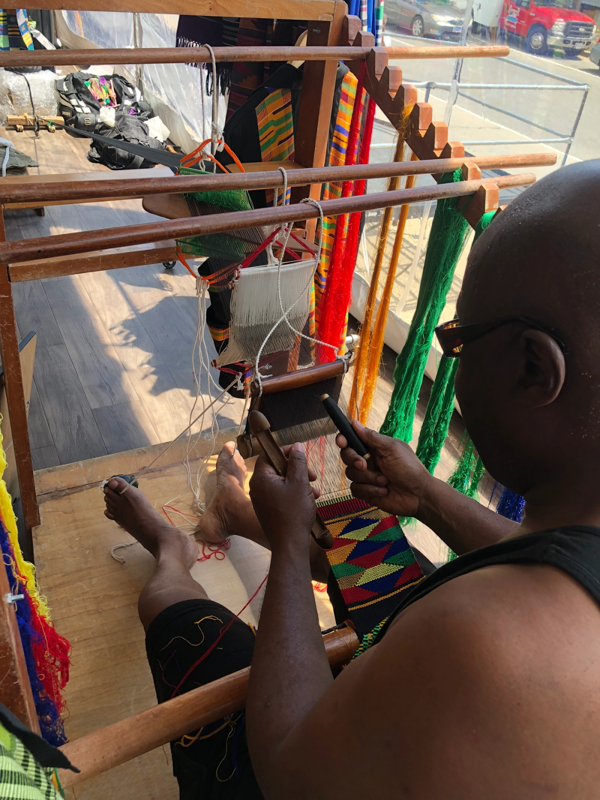 Kwesi Asare, a kente weaver reviving   Ghanaian traditional arts.