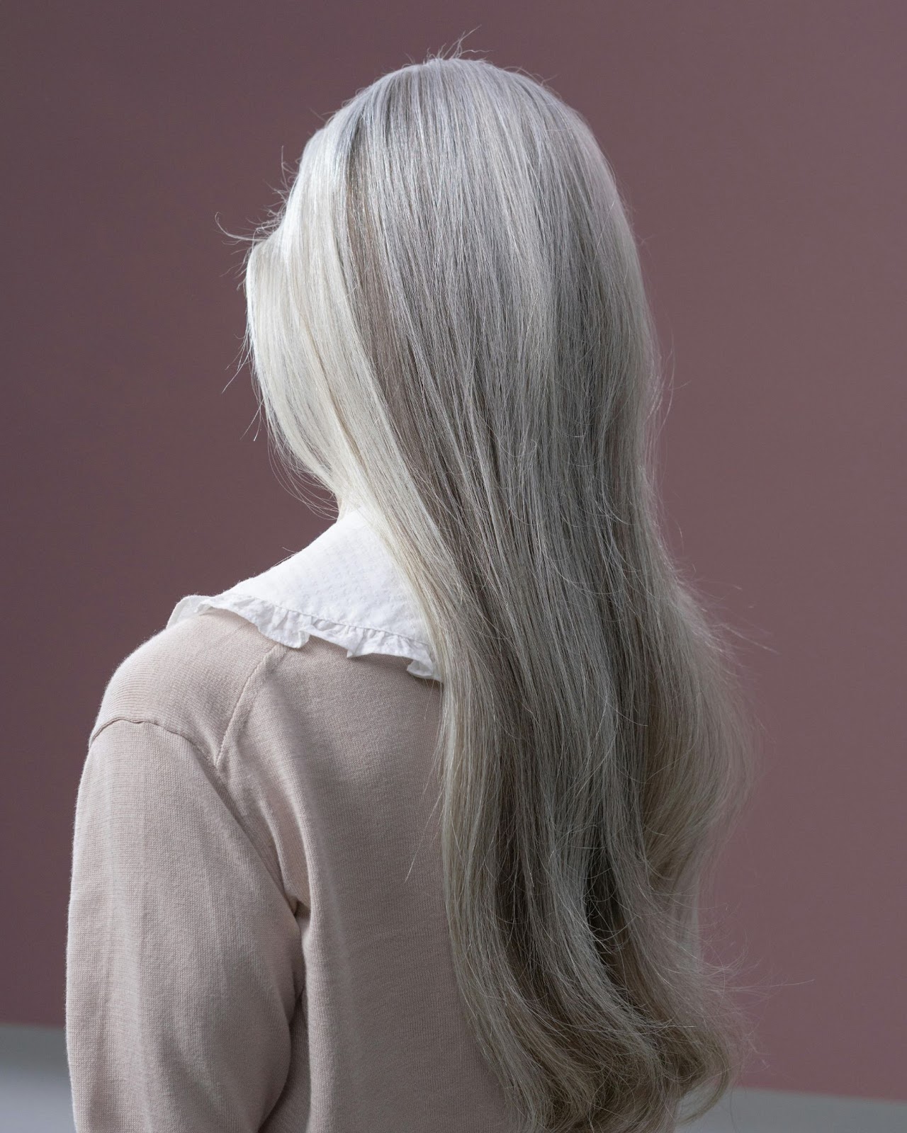 A lady with light ash blonde hair