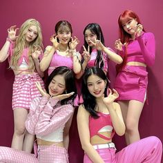 This contain STAYC are posing in pink outfits