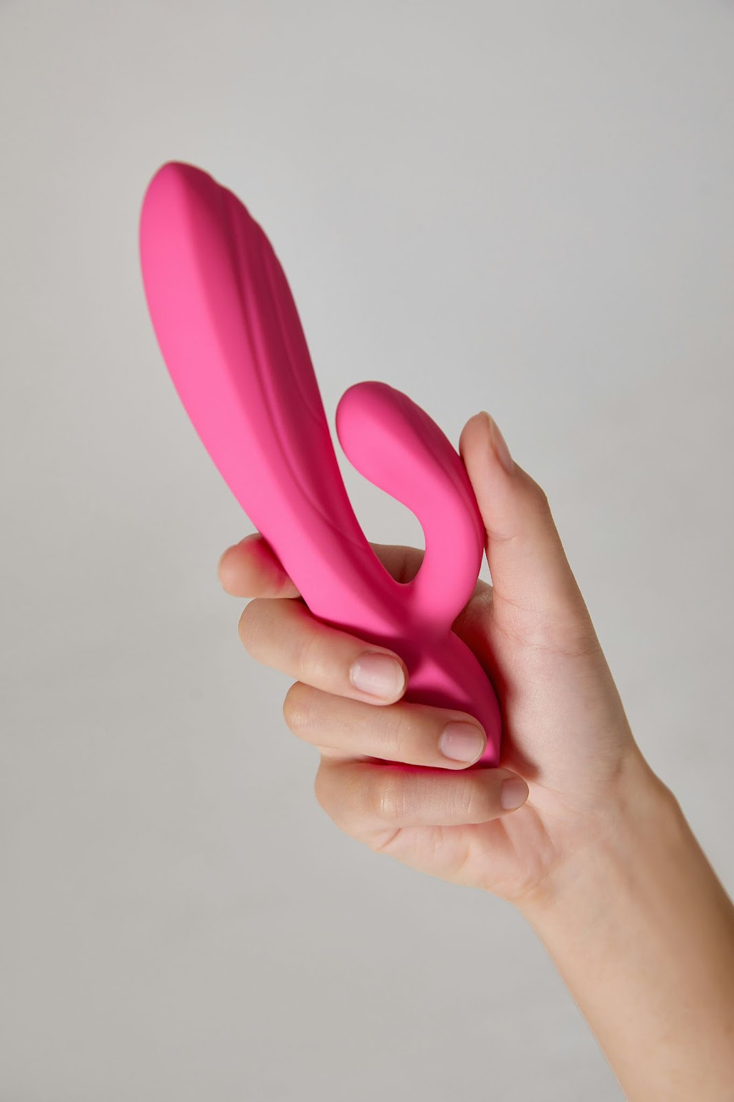 Alt Image: A pink rabbit vibrator, by Womanizer Toys via Unsplash.