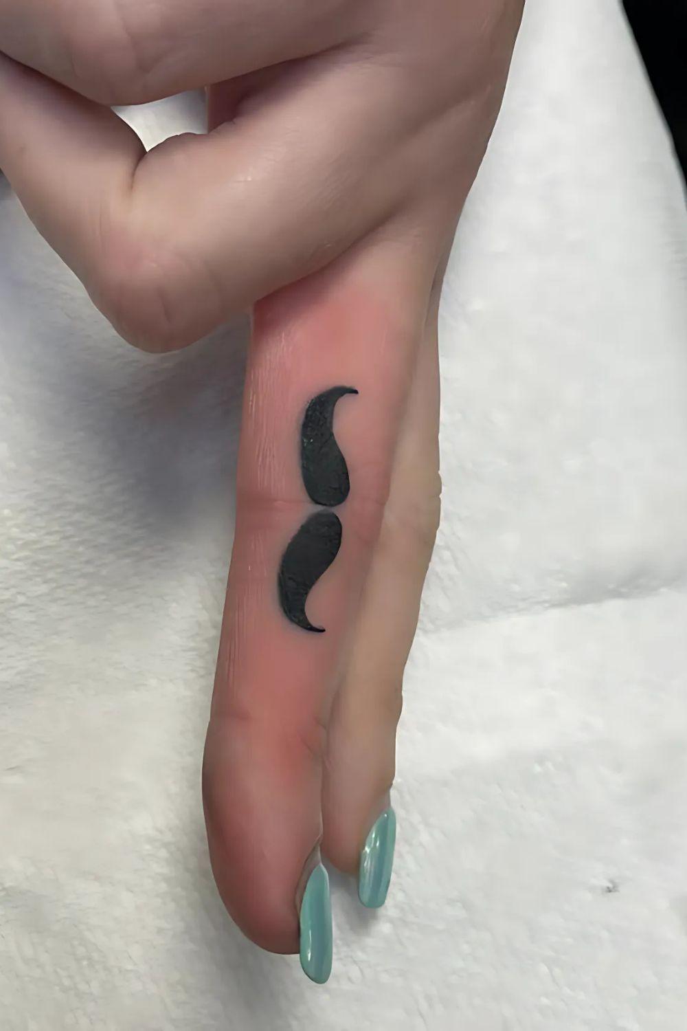 Mustache Finger Tattoo